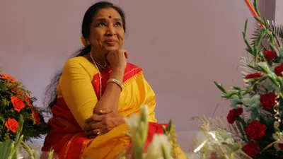 Legendary Bollywood film music playback singer, Asha Bhosle poses on her 74th birthday at her residence in Mumbai, September 8, 2007. Entrepreneur, actress and television personality who predominantly works in Indian cinema. Known for her versatility, she has been described in the media as one of the greatest and most influential singers in Hindi cinema. cinema, theater, movies, vocalist