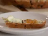 A piece of Irish soda bread on a white plate.